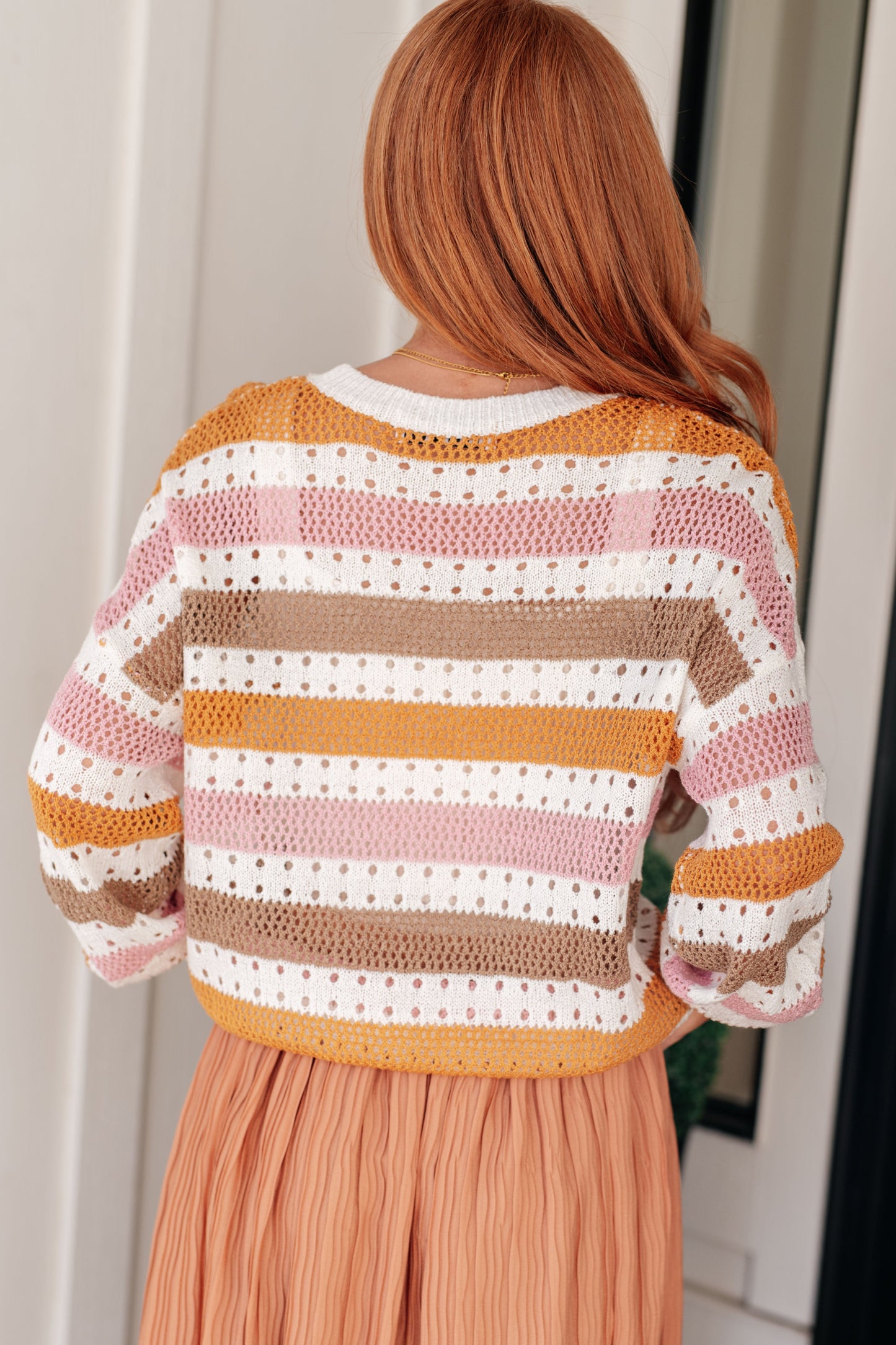 Ahead of the Curve Striped Sweater