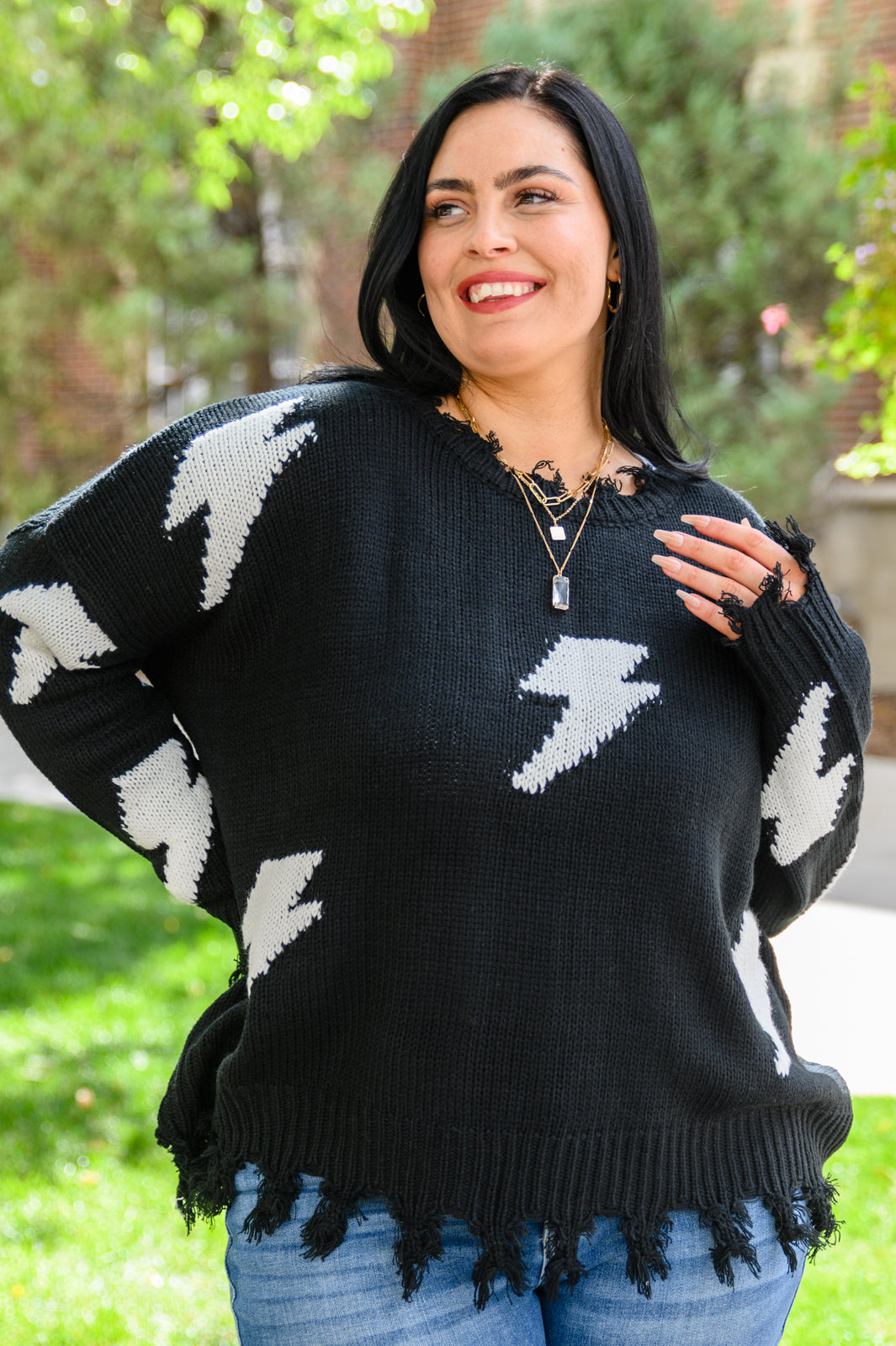 Flashy and Fierce Raw Hem Sweater in Black