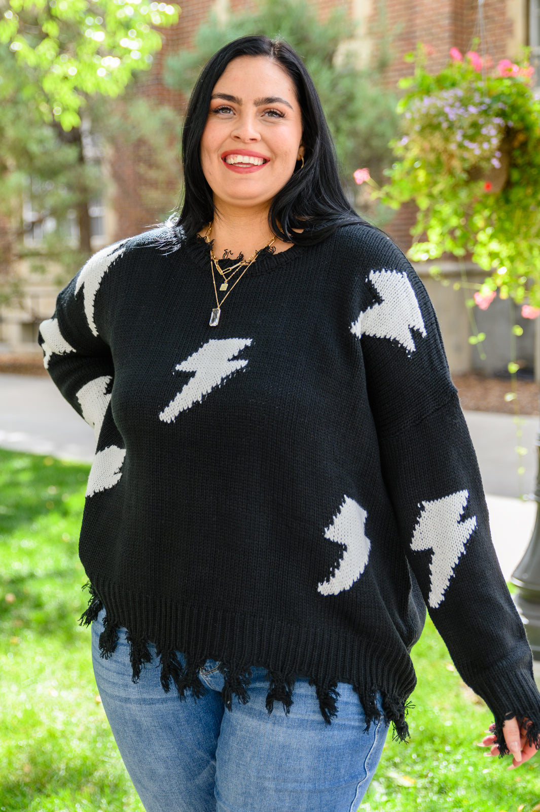 Flashy and Fierce Raw Hem Sweater in Black