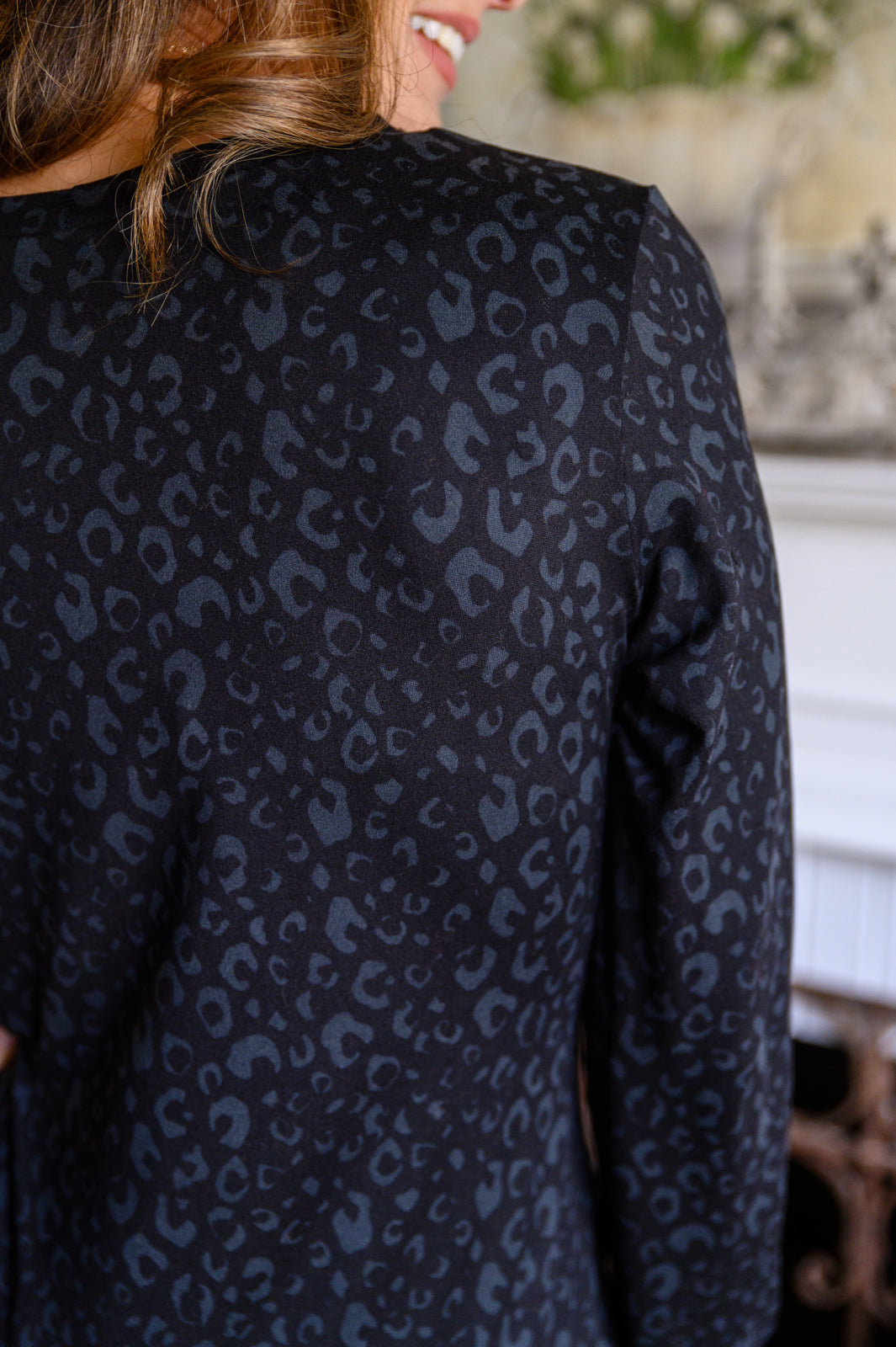Wild and Wishful Ruched Animal Print Dress In Black