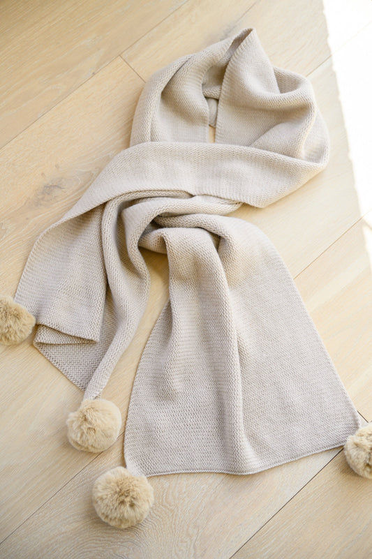 Warm Fuzzies Knitted Pom Pom Scarf In Beige Beige OS