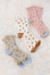 Celeste Star Design Socks In Beige   
